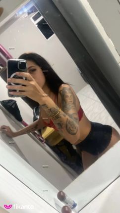 Morena tatuada - foto no feed de Ouro Preto do Oeste