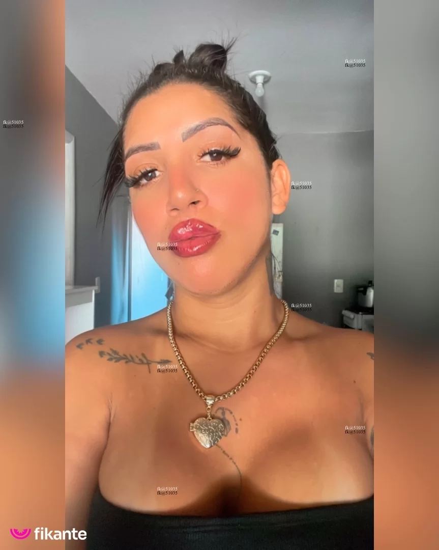 Morena tatuada - foto no feed de Ouro Preto do Oeste