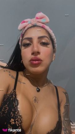 Morena tatuada - foto no feed de Ouro Preto do Oeste