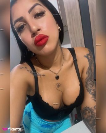 Morena tatuada - foto no feed de Ouro Preto do Oeste