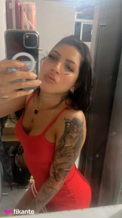 Morena tatuada - foto no feed de Ouro Preto do Oeste