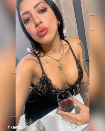 Morena tatuada - foto no feed de Ouro Preto do Oeste