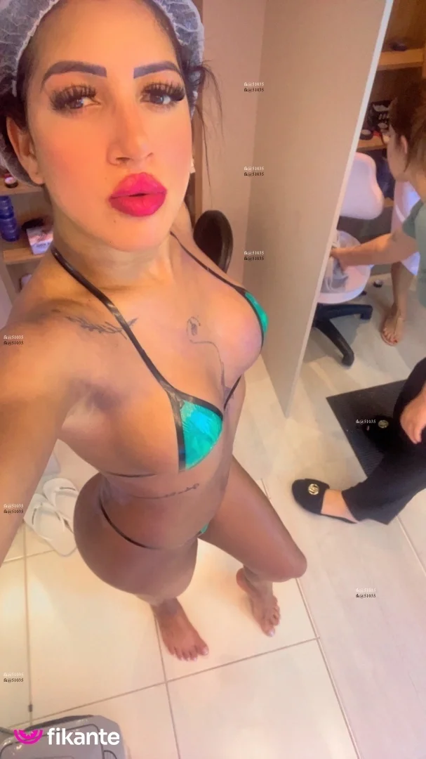Morena tatuada - foto no feed de Ouro Preto do Oeste