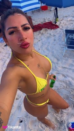 Morena tatuada - foto no feed de Ouro Preto do Oeste