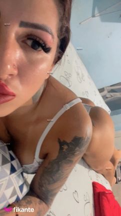 Morena tatuada - foto no feed de Ouro Preto do Oeste