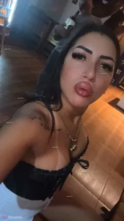 Morena tatuada - foto no feed de Ouro Preto do Oeste